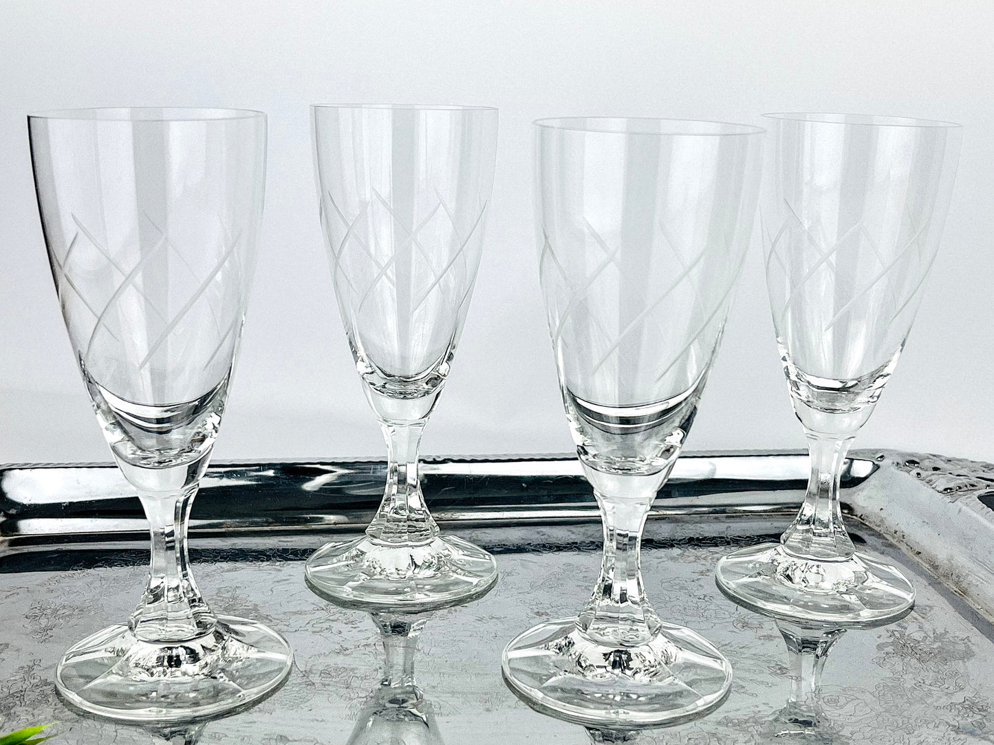 French etched swirl pattern with octagonally cut stems (1970s)