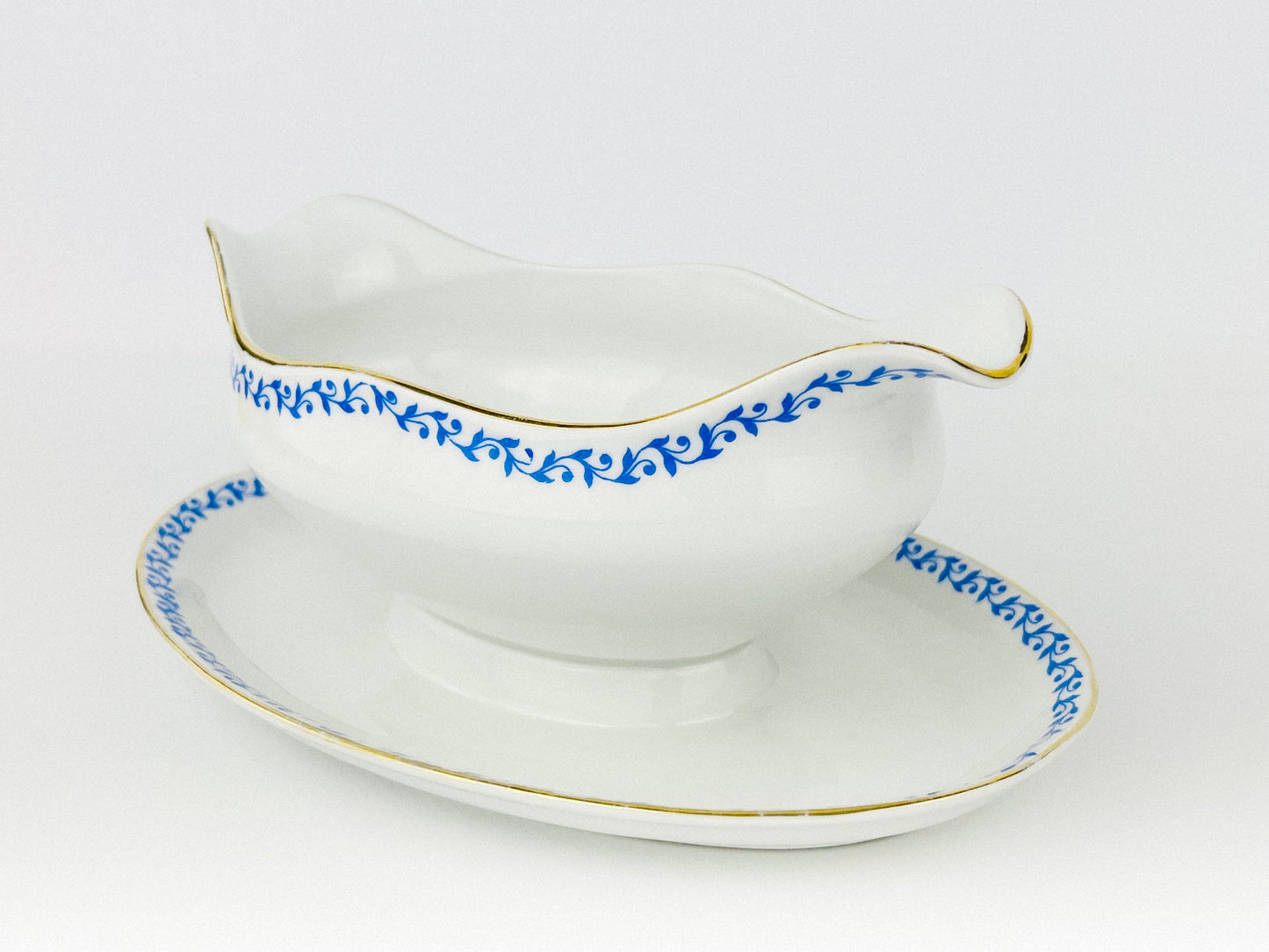 French Porcelain sauce boat with attached underplate (France - 1960s)