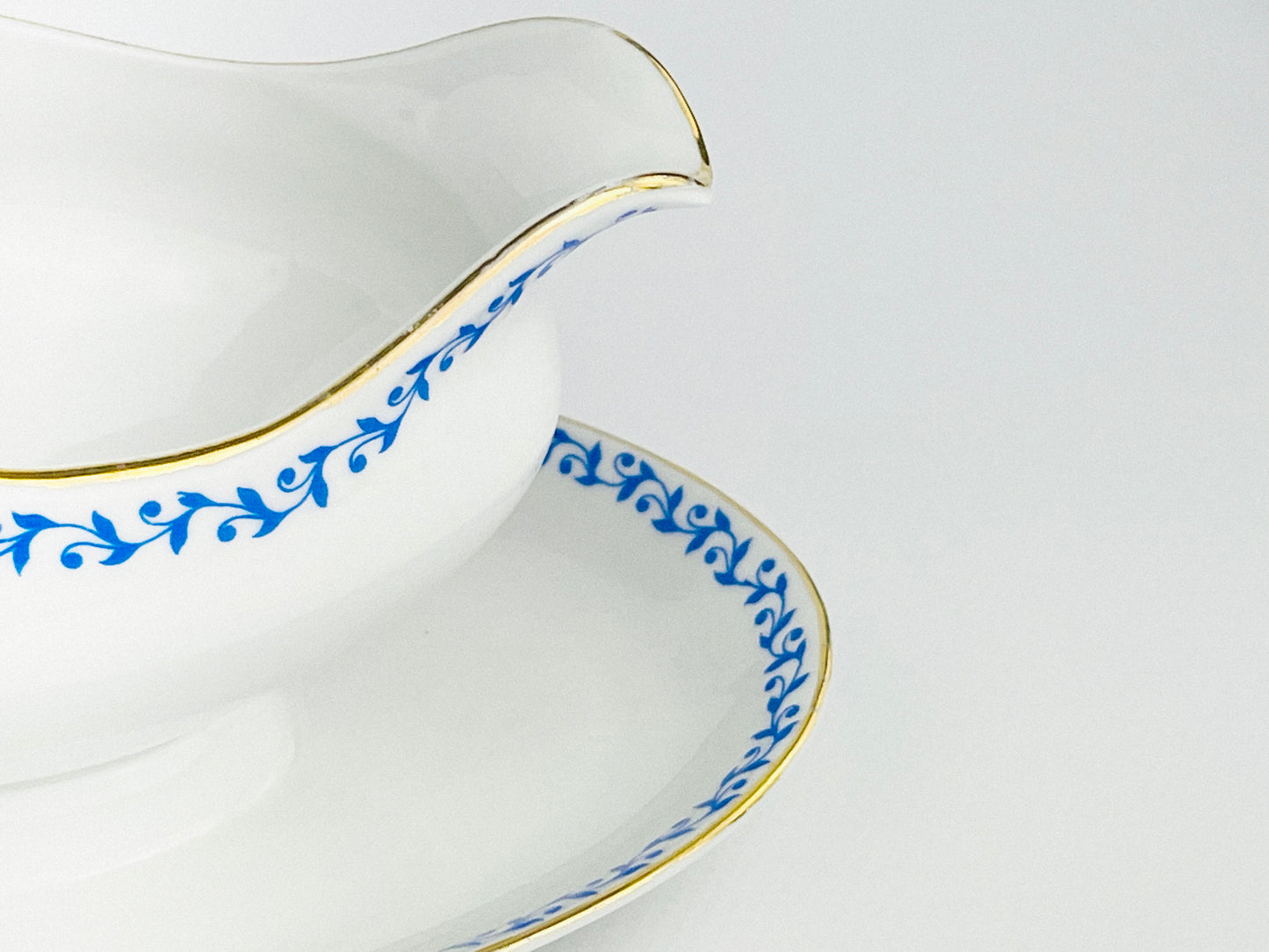 French Porcelain sauce boat with attached underplate (France - 1960s)