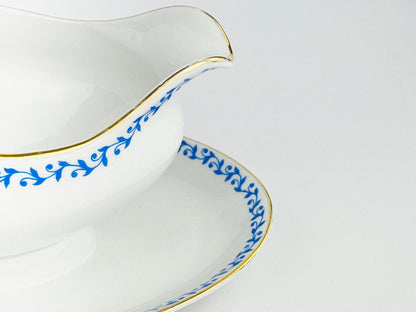 French Porcelain sauce boat with attached underplate (France - 1960s)
